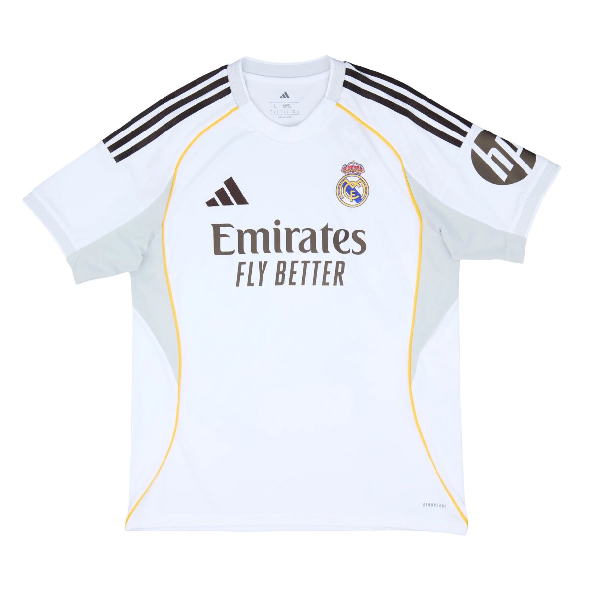 Camisa Real Madrid I 25/26 Masculina Torcedor 1 Camisa Real Madrid I 25/26 Masculina Torcedor na cor branca, com detalhes em amarelo e cinza, três listras pretas nos ombros..