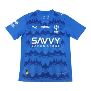 Camisa Al Hilal I 25/26 Masculina Torcedor azul royal com grafismo inspirado na arquitetura tradicional de Najd