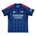 Camisa Arsenal away 25/26 azul-marinho masculina com detalhe de raio inspirado no Royal Arsenal Gatehouse.