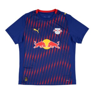Camisa RB Leipzig II 25/26 azul marinho com grafismo vermelho frontal, gola redonda bicolor e lema "You can do Anything" nas costas.