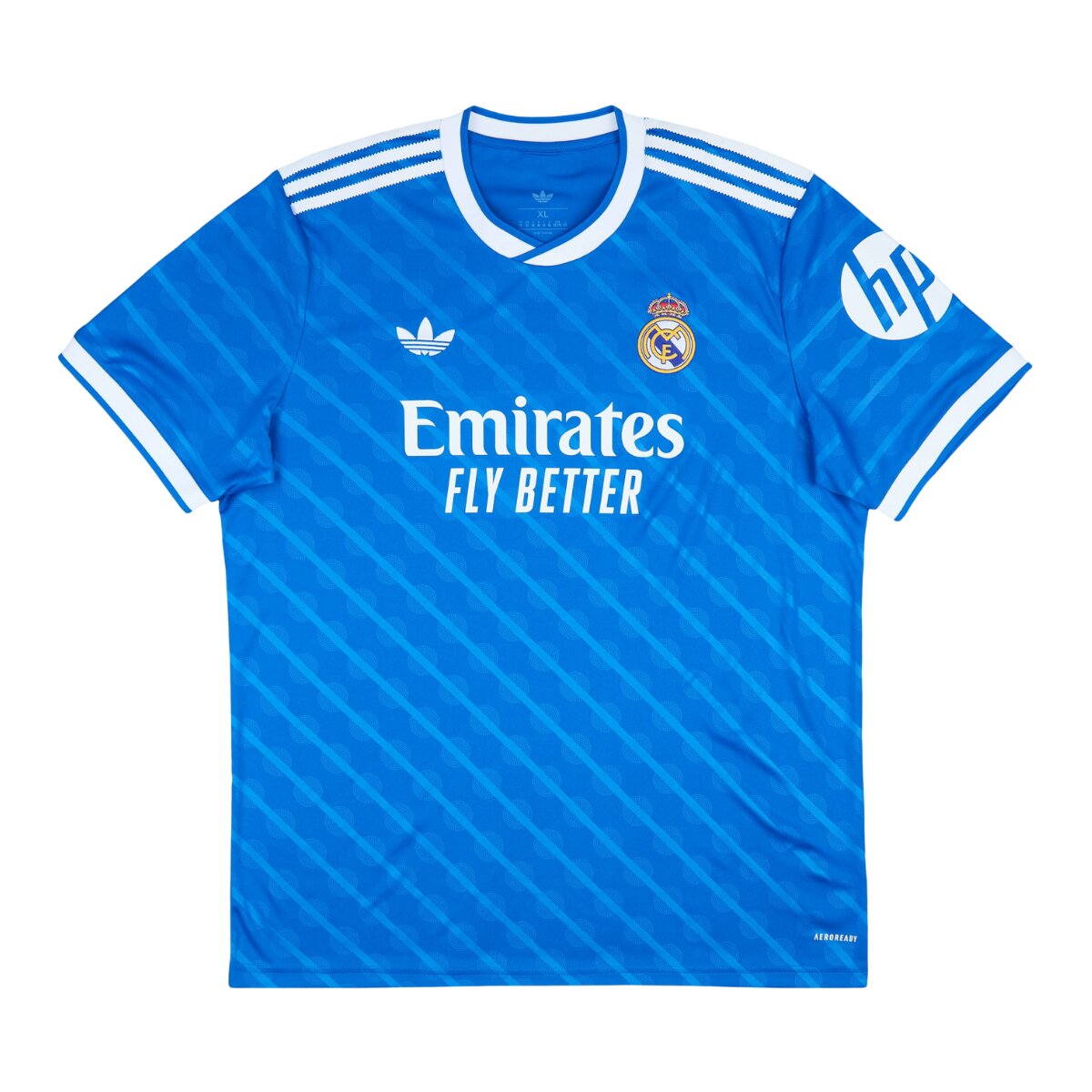 Camisa Real Madrid III 25/26 Masculina Torcedor 1 Camisa Real Madrid III 25/26 Masculina Torcedor azul com detalhes brancos e amarelos, inspirada no Santiago Bernabéu