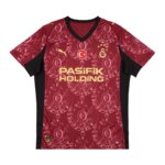 Terceira camisa Galatasaray 25/26 bordô com gola V preta e detalhes dourados