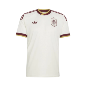 Camisa reserva da Espanha 26/27 masculina creme com detalhe na gola e punhos vermelhos e amarelos
